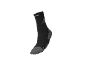 Chaussette de sport noire avec accents gris et texte blanc.
