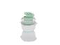 Un bol de mélange blanc avec un couvercle vert et un petit bol