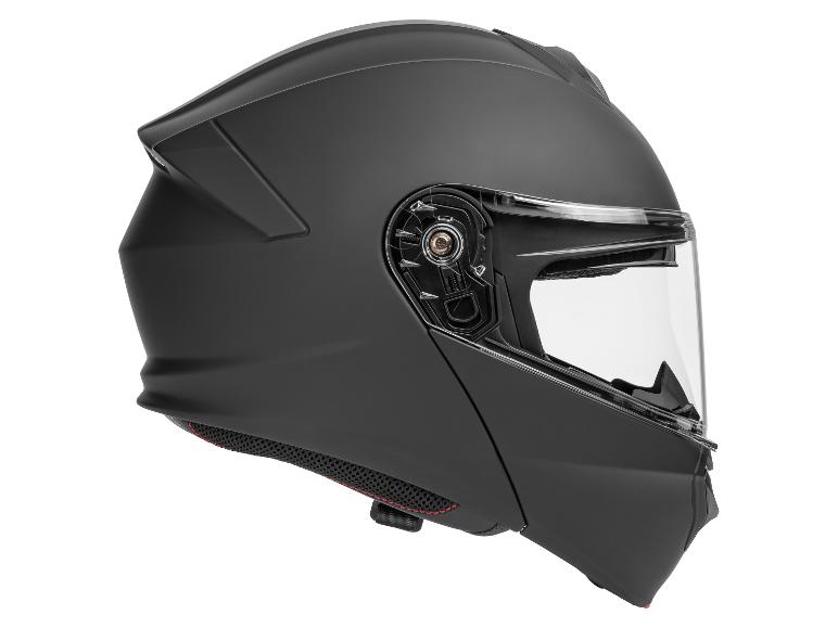 Casque de moto modulaire noir mat avec visière, vue latérale.