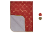 Nappe laquée festive LIVARNO® rouge avec motifs de Noël dorés, le verso est visible.