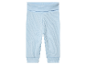 Pantalon bébé bleu clair côtelé.