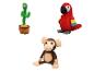 Jouets en peluche : un perroquet rouge, un singe et un cactus.