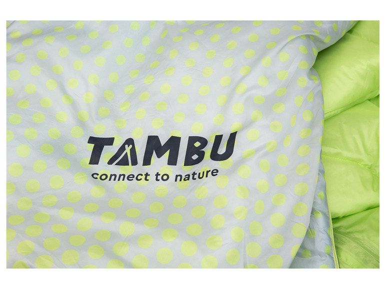 Une veste verte à pois blancs avec le logo Tambu.