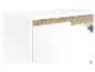 Armoire blanche avec détails en bois.