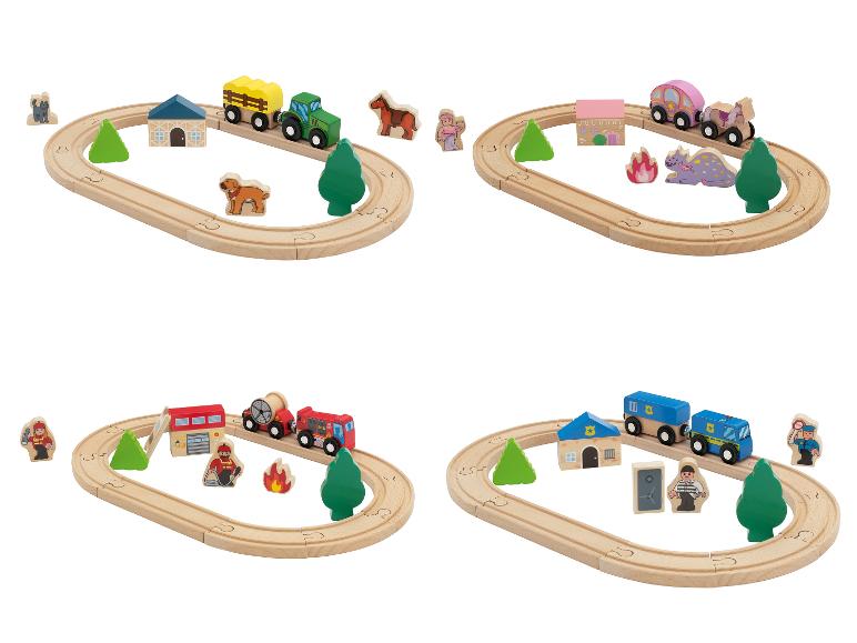 Quatre ensembles de trains en bois avec des thèmes de ferme, princesse, pompiers et police.