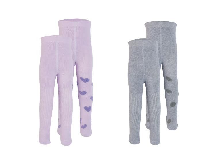 Collants bébé LUPILU®: deux paires de collants violets à cœurs et deux paires de collants gris à pois.