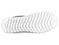 Semelle blanche d'une basket marine.