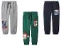 Trois pantalons de survêtement pour enfants avec Superman, Mickey Mouse, Dingo et Pat' Patrouille.