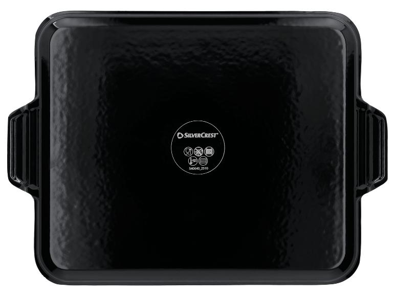 Plat de cuisson noir avec poignées, affichant des symboles de compatibilité au four et au lave-vaisselle.