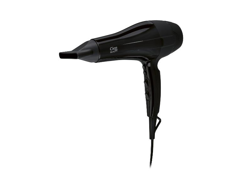 Sèche-cheveux noir avec embout concentrateur et boutons de commande sur la poignée.