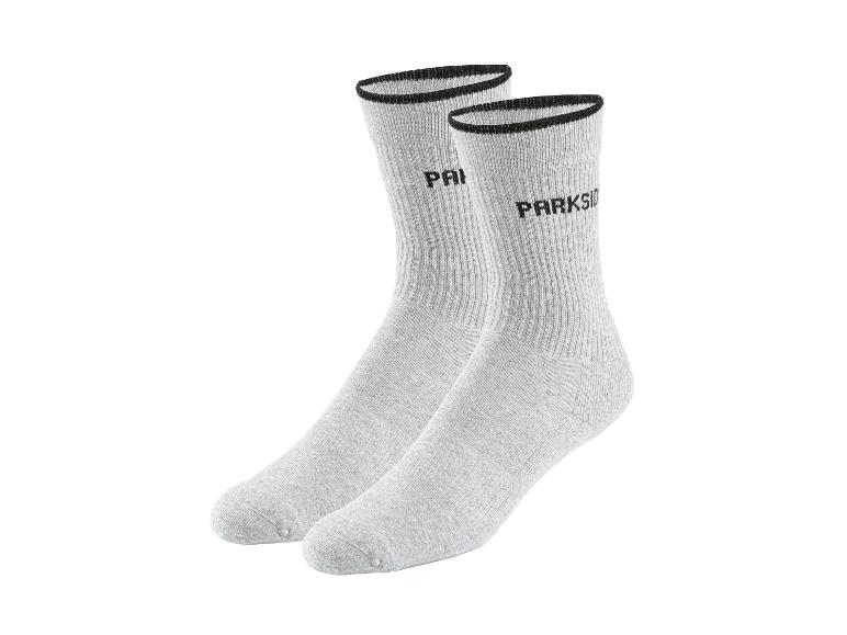 Paire de chaussettes gris clair côtelées avec revers noirs et marque 'PARKSIDE'.