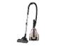 Aspirateur Philips : modèle beige clair avec tube et accessoires.