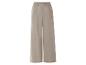 Pantalon large beige : vêtement décontracté et élégant.