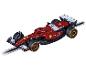 Voiture de course miniature de Formule 1 Carrera sur la piste.