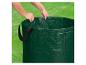 Un sac de jardin vert avec des poignées dans les mains.