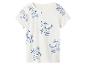 T-shirt blanc avec motifs de chiens bleus sur skateboard.