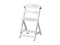 Chaise haute Safety 1st blanche avec dossier, assise et repose-pieds.