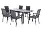 Mobilier d'extérieur: table à manger gris foncé avec six chaises assorties.