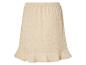 Jupe beige à découpes, style bohème.