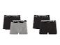 Quatre boxers, deux noirs et deux gris, de la marque Reebok.
