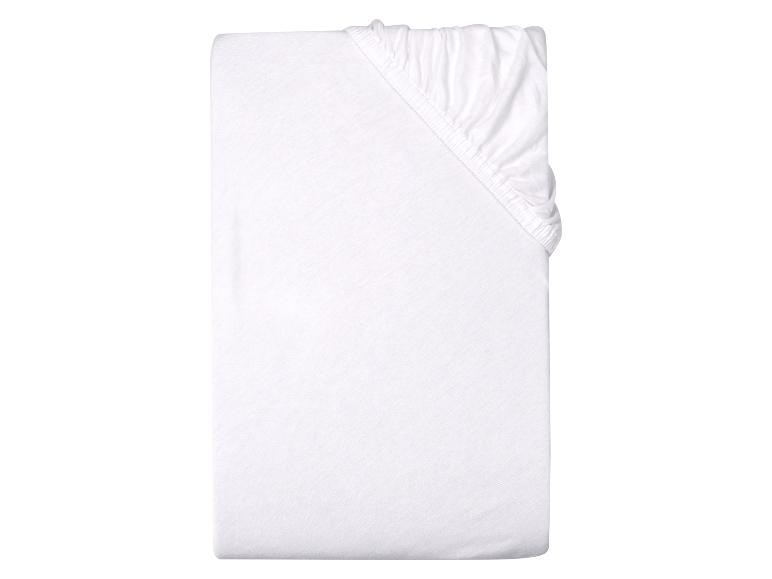 Drap-housse blanc plié