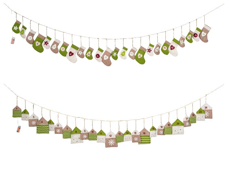 Guirlande calendrier de l'Avent LED LIVARNO home en forme de chaussettes et de maisons.