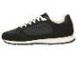 Chaussure de sport noire pour homme avec lacets et semelle blancs