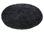 Un tapis rond de couleur gris foncé
