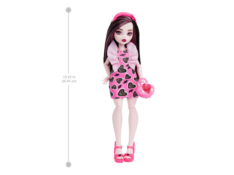 Une poupée Monster High avec une robe rose et des accessoires.