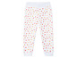 Pantalon blanc avec un motif de cœurs roses, jaunes et rouges.