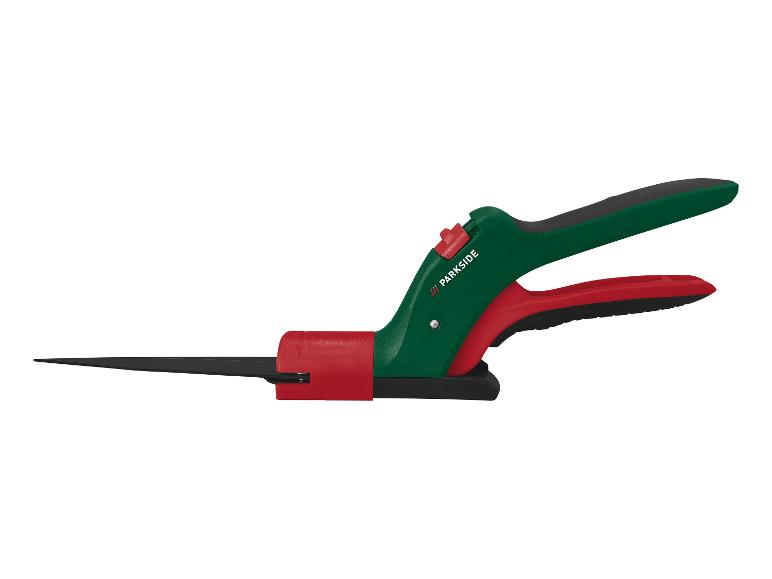 Cisaille à gazon PARKSIDE verte et rouge avec lames noires.