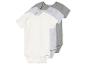 Trois bodys bébé en coton, blanc et gris.