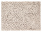 Un tapis de bain doux, beige, avec une texture épaisse et moelleuse.