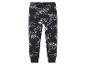 Pantalon bleu foncé avec un imprimé blanc de pelles mécaniques