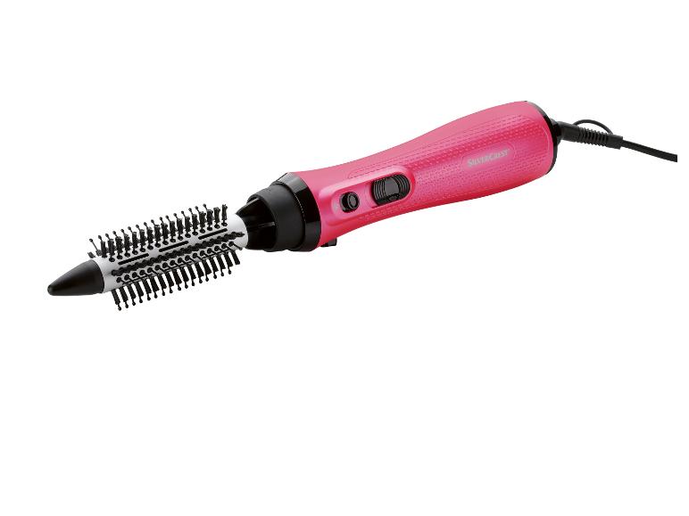 Sèche-cheveux rotatif SilverCrest rose avec embout brosse.