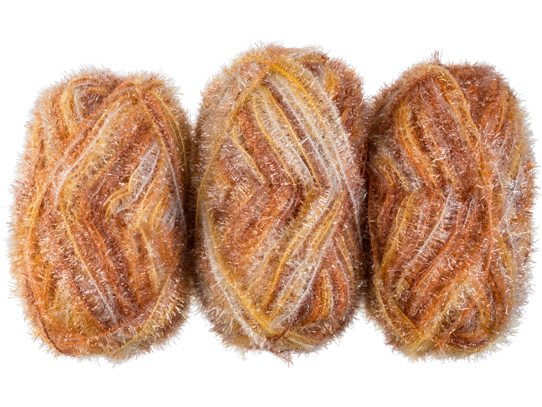 Trois pelotes de fil fantaisie marron, orange et blanc sur fond noir.