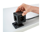 Cube multiprise Tronic noir, fixé sur un plan de travail blanc