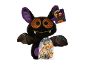 Peluche de chauve-souris d'Halloween avec un sachet de bonbons.