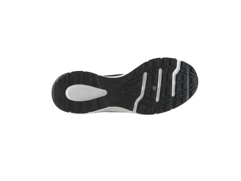 Semelle de chaussures de sport noire et blanche.