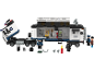 Jeu de construction pour enfants avec camion de police, figurines et accessoires.