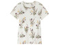 Un t-shirt blanc à imprimé floral.