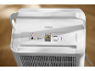 Déshumidificateur blanc avec écran numérique indiquant le taux d'humidité.