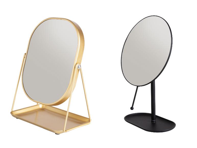Deux miroirs de table : un miroir ovale doré avec un plateau et un miroir rond noir.