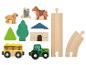 Jouets en bois sur le thème de la ferme, incluant des animaux, des arbres, un bâtiment, un tracteur et des rails.