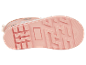 Semelle rose d'une botte de pluie pour enfant avec un motif animalier.