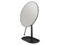 Miroir de table ovale noir avec base robuste et angle réglable.