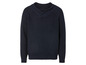 Un pull bleu marine en tricot avec un col roulé.