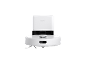 Robot aspirateur blanc avec base ronde et station de charge.