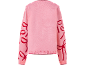 Pull en tricot rose pour enfant avec des motifs de nœuds rouges sur les manches, vue arrière