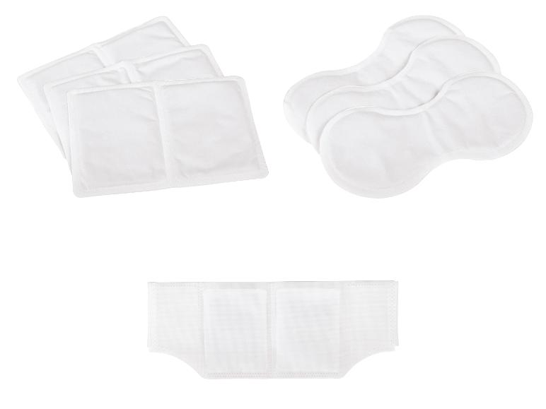 Protections et inserts jetables blancs pour produits d'incontinence ou d'hygiène.